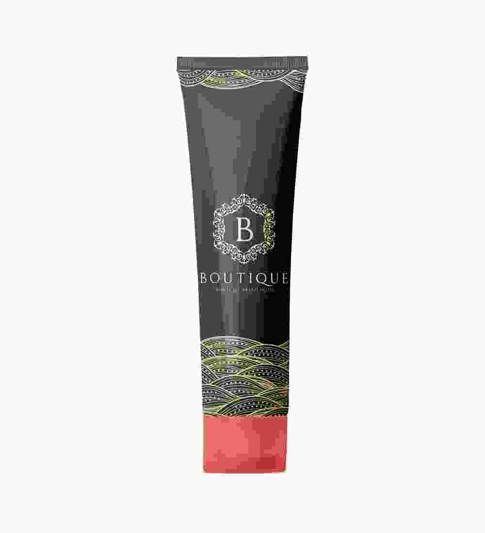 A tube of lotion with a black background