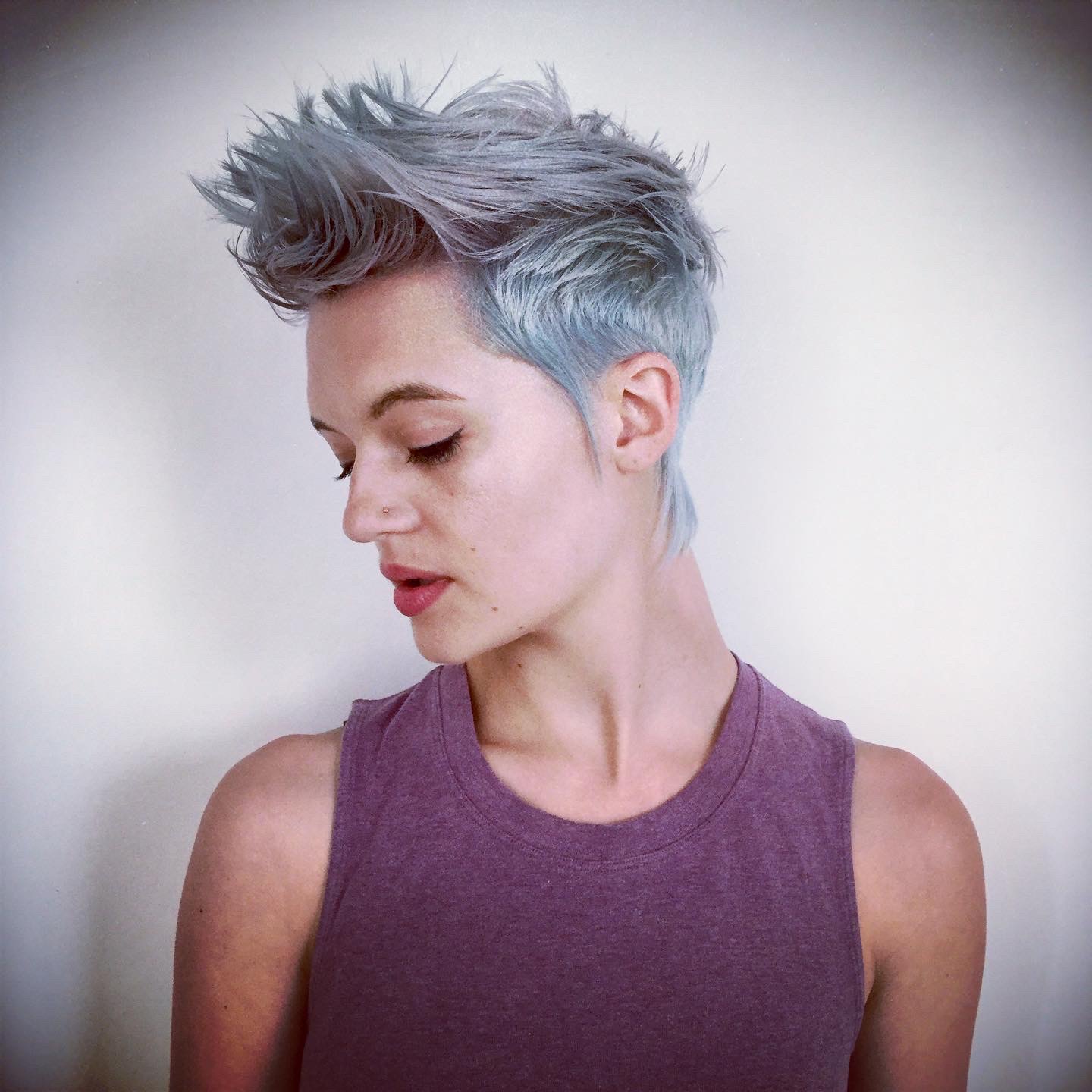 Woman with short, silver hair.